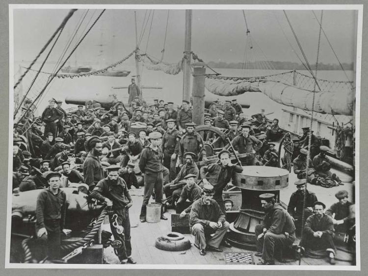 sailors on deck of warship