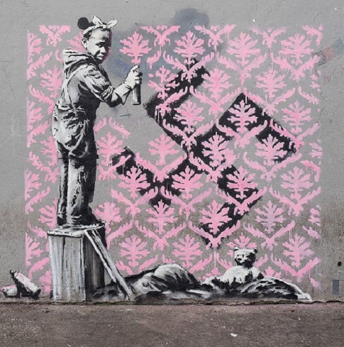 banksy se raspistoljio u parizu murali za prava migranata i podsjecanje na 68 6780 9016