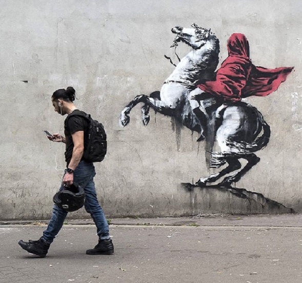 banksy se raspistoljio u parizu murali za prava migranata i podsjecanje na 68 6780 9018