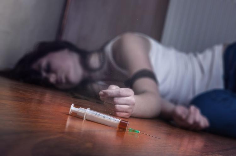 young woman passed out after heroin injection 1024x680
